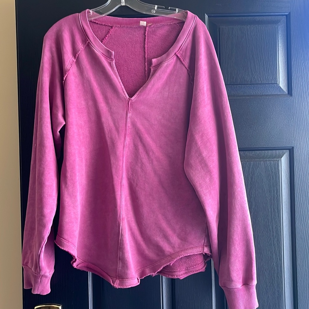 Pistola pinkish purple pullover in sweatshirt material.  Raw edge finish